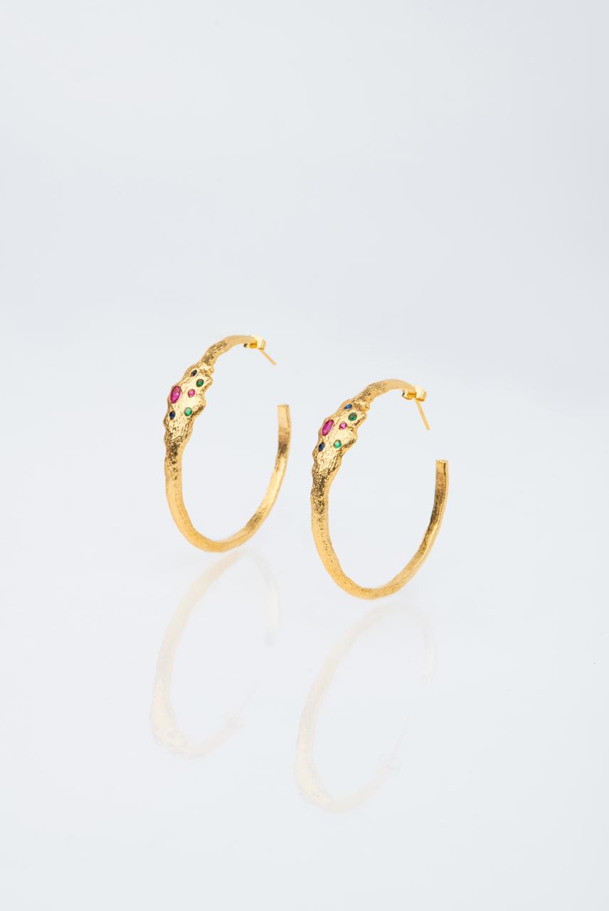 Rita Harb in “The Vivid Bloom Earrings”