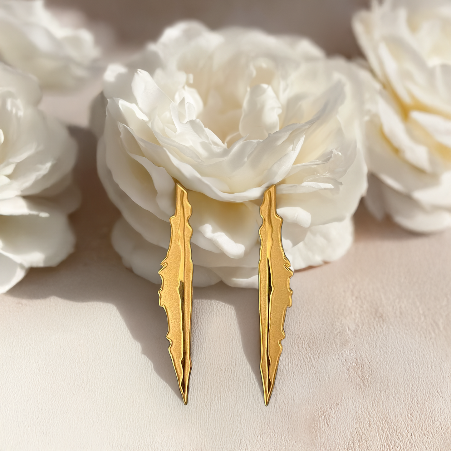 The Feathers Sword Earrings