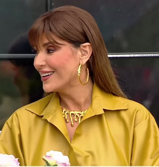 Rita Harb in “The Vivid Bloom Earrings”