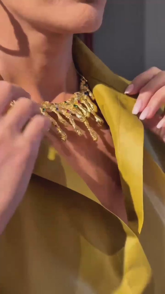 Rita Harb in “The Celestial Droplets Necklace”